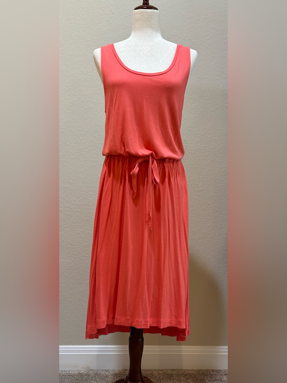 Feel refreshed with this coral red, lightweight dress.